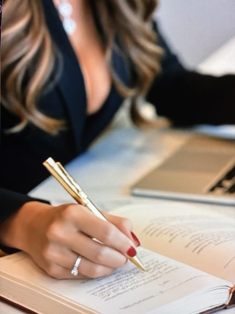 Lora R. Lozano, Esq. signing case documents